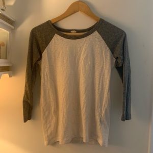 Two t shirts one navy sleeves one grey sleeves